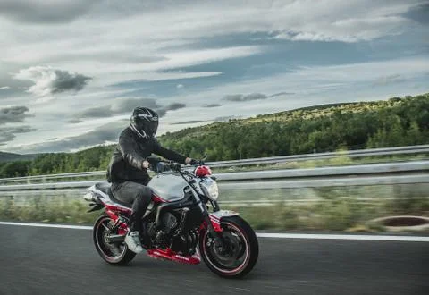 Split, Croatia June 2020 Driver on Yamaha Fazer motorbike, white and red Abar Stock Photos