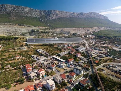 SPLIT, CROATIA - SEPTEMBER 9, 2026 CEMEX mining landscape features broad terr Stock Photos