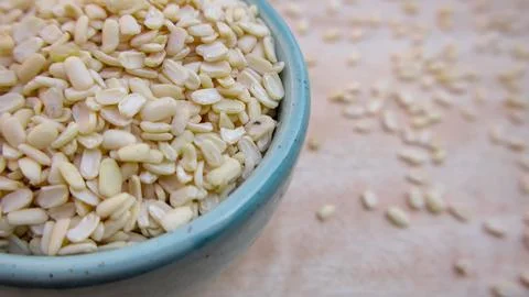 Split Dehusked Black Gram Lentils in a Blue Bowl, Closeup Stock-Fotos