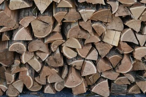 Split firewood stacked for background Fotos Stock