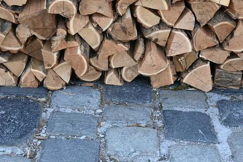Split firewood stacked for background Фото