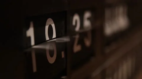 Split flap arrival departure board clock changes times Stock Footage 45595443