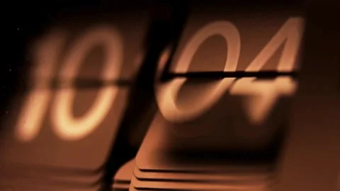 Split-Flap Clock Close-Up - 4K Ultra HD Video of Time Change from 9:54 to 10:24 Stock Footage 278667748