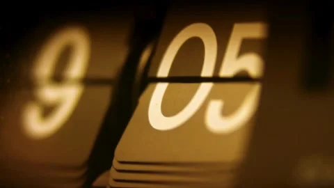 Split-Flap Clock Close-Up - 4K Ultra HD Video of Time Change from 9:54 to 10:24 Stock Footage 278667776