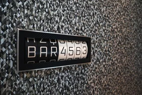 Split flap display reading BAR 4563 in a textured wall in Japan Stock Photos