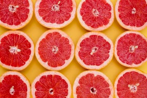 Split Grapefruits closeup Stock Photos