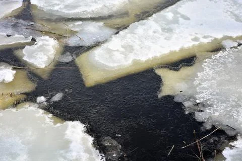 Split ice on the river in spring Stock Photos