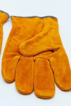 Split leather gloves offer protection for hands during tough tasks Stock Photos