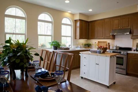 Split-level open plan dining area and kitchen at home Foto stock