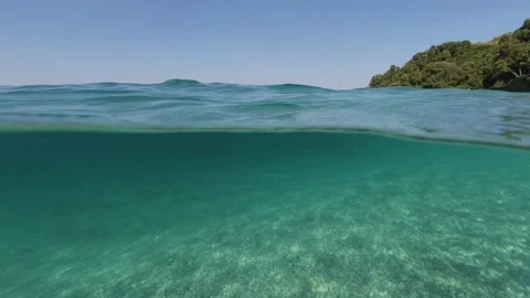 Split level view of turquoise sea water, underwater and sky 스톡 동영상 338182014
