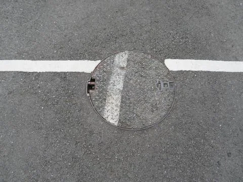 Split line cut discontinuous moved metal sewer Stock Photos