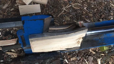 Split log machine - Scandinavian forest work - chopping wood Stock-Footage 251705268
