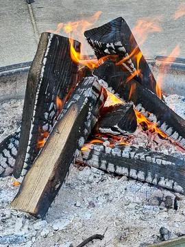 Split Logs In A Fire Pit Stock Photos