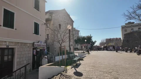 Split Old Town Street with Scooters and Market on a Sunny February Day Видео 331646827