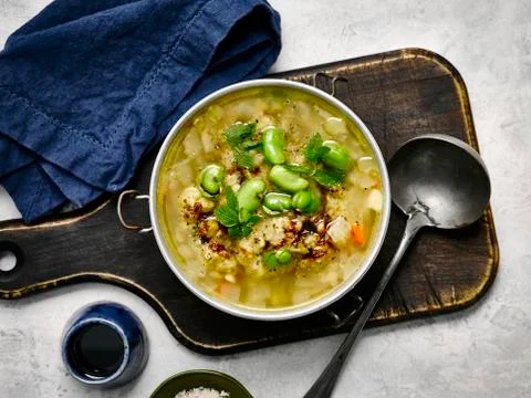 Split pea soup with lentils and pomegranate juice Stock Photos