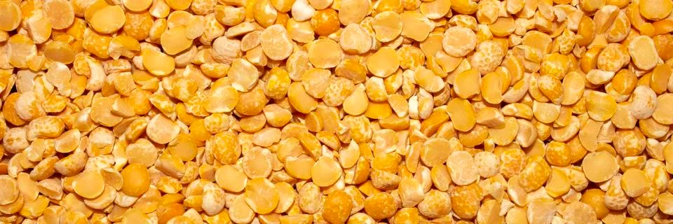 Split peas top view.The texture of the split peas. Stock Photos