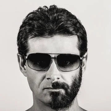 Split personality - portrait of man with half shaved face split personalit... Stock Photos