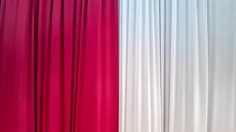 Split Red and White Draped Curtain Backdrop High Contrast Vertical Stock Photos
