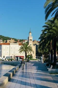 Split riviera seaside with barely anyone outside during coronavirus outbreak  Stock Photos