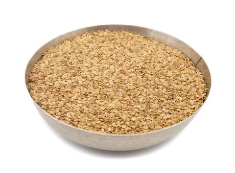 Split Roasted Coriander Seeds on White Background Stock Photos