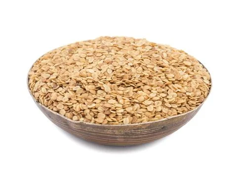 Split Roasted Coriander Seeds on White Background Stock Photos