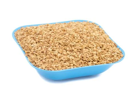 Split Roasted Coriander Seeds on White Background Stock Photos