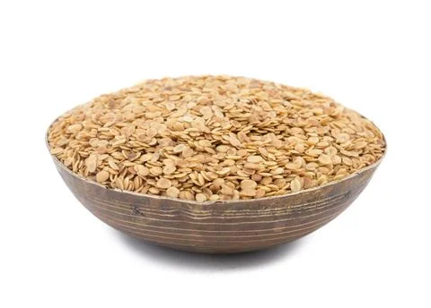 Split Roasted Coriander Seeds on White Background Stock Photos