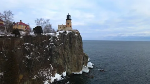 Split rock Light house on a winter landscape Video stock 170051893