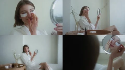 Split Screen of Brunette Girl Pressing Hydrogel Under-Eye Patches with Fingers 動画素材 300107933