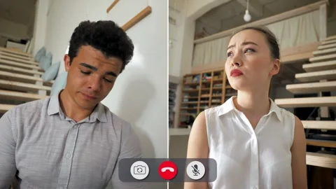 Split screen call with bored man and woman at home Stock Footage 326949836