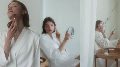 Split Screen of Girl Massaging Face with Jade Roller Holding Makeup Mirror Stock Footage 300107613