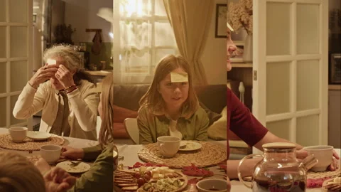 Split Screen of Multigenerational Family Playing Guessing Game at Home Stock-Footage 347360189