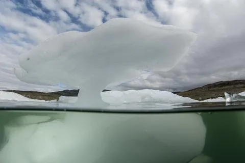 Split shot of a piece of a small iceberg Stock Photos