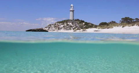 Split shot, Turquoise waters off Pinky beach of Rottnest Island, Perth Australia Stock Footage 145473409