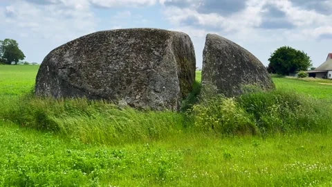 The Split Stone, a split stone block that is 14 m. long, 9 m. wide and 3 m. Stock Footage 311601087