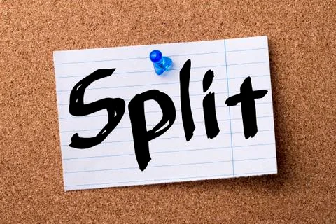 Split - teared note paper pinned on bulletin board Foto stock