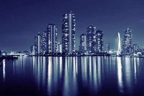 Split toned image of Tokyo skyline in modern Tsukishima district with scen... Stock Photos