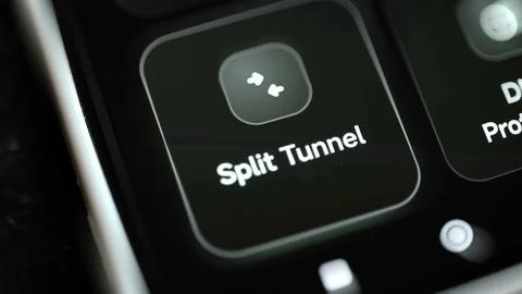 Split tunnel button routes selected application traffic 스톡 사진