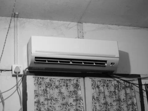 SPLIT-TYPE AIR CONDITIONER MOUNTED ON WALL Stock Photos