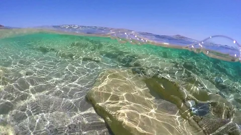 Split underwater view in Piscina Rei Stock Footage