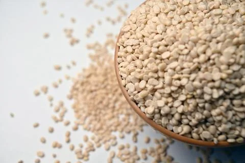 Split Urad Dal in Spoon, Angled Top View Macro Photograph with Negative Spa.. Stock Photos