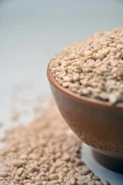 Split Urad Dal in Spoon, Angled Top View Macro Photograph with Soft Defocus.. Stock Photos