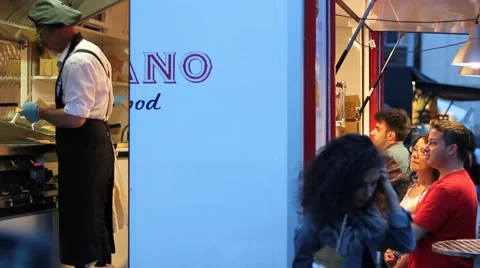 Split view of a chef and people waiting for food Stock Footage 64433961