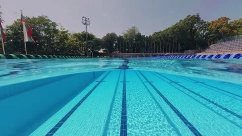 Split View Empty Outdoor Olympic Swimming Pool Lanes Stock-Footage 342020684