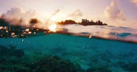 Split view of the tropical sea and island during sunset in the Maldives Stock Footage 209641654