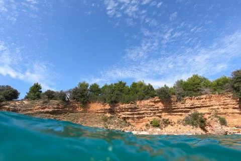 Split view from underwater and seascape Beach Scene, empty tropical beach with Stock Photos