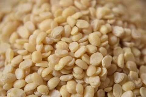 Split White Urad Dal. Vigna mungo Beans as an abstract background texture Foto stock