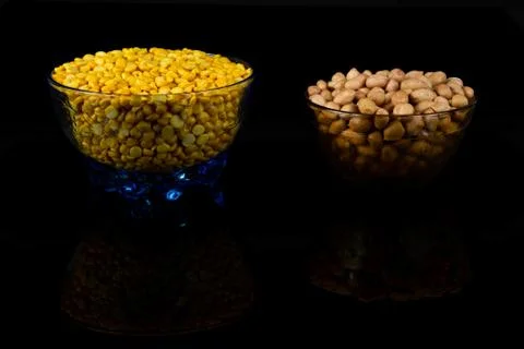 Split yellow gram and ground nut in a bowl Stock Photos