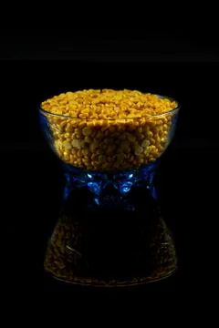 Split yellow gram in a bowl on the table Stock Photos