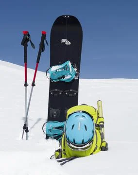 Splitboard, trekking poles and backpack 스톡 사진